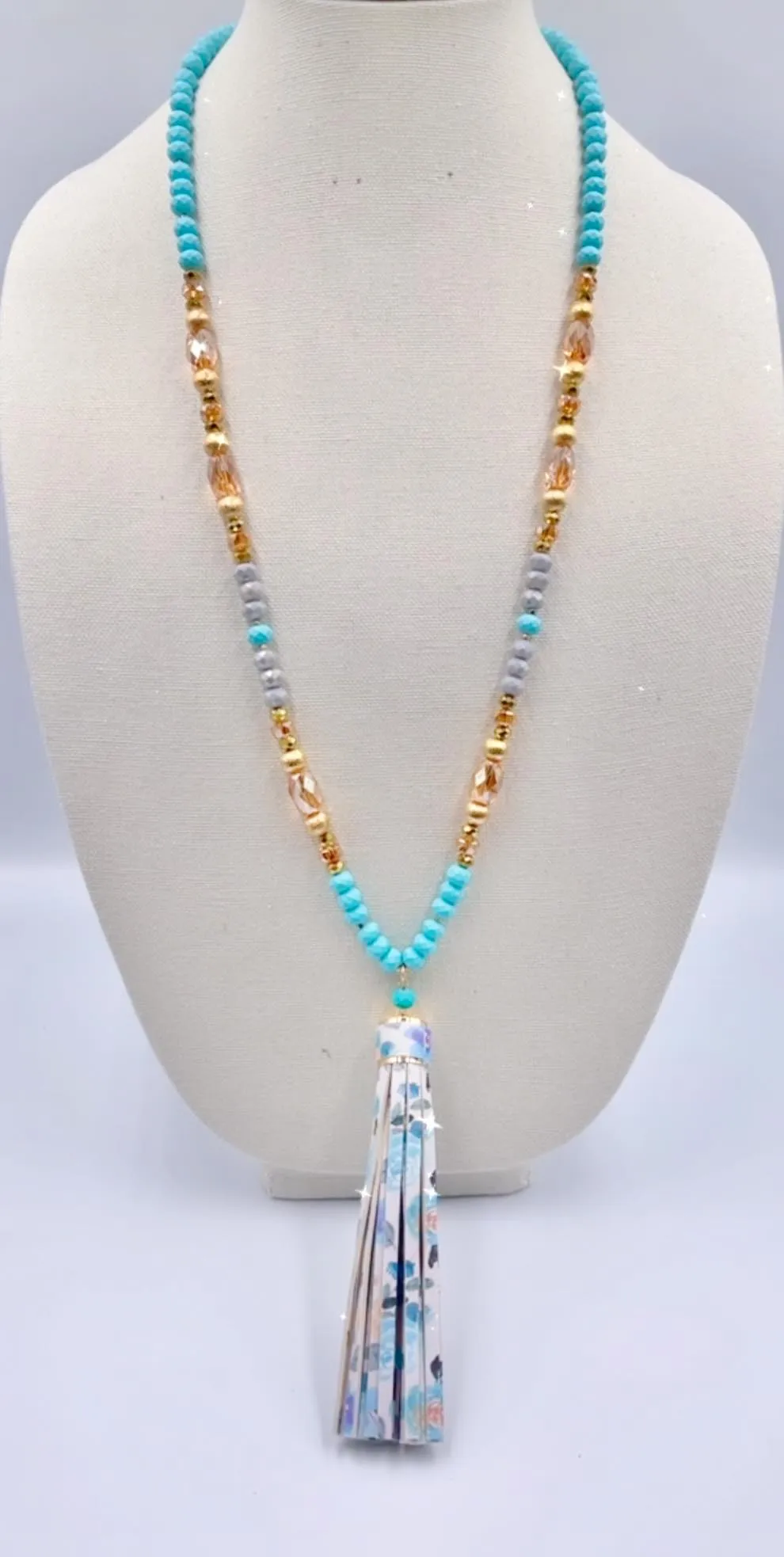 Beautiful Turquoise & gold crystal necklace with floral tassel