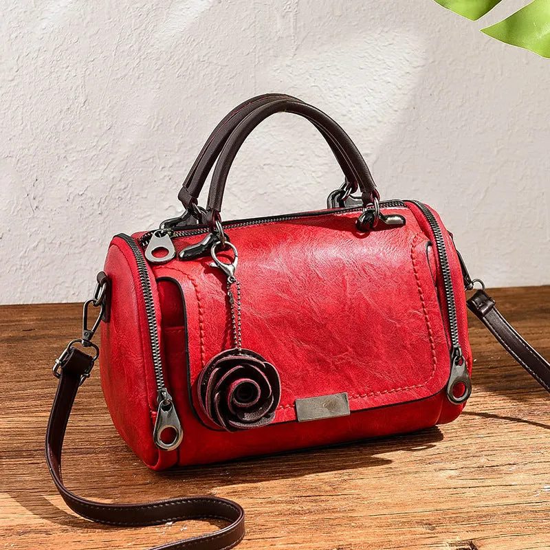 New solid color retro pillow bag women's bag small flower pendant style crossbody shoulder bag